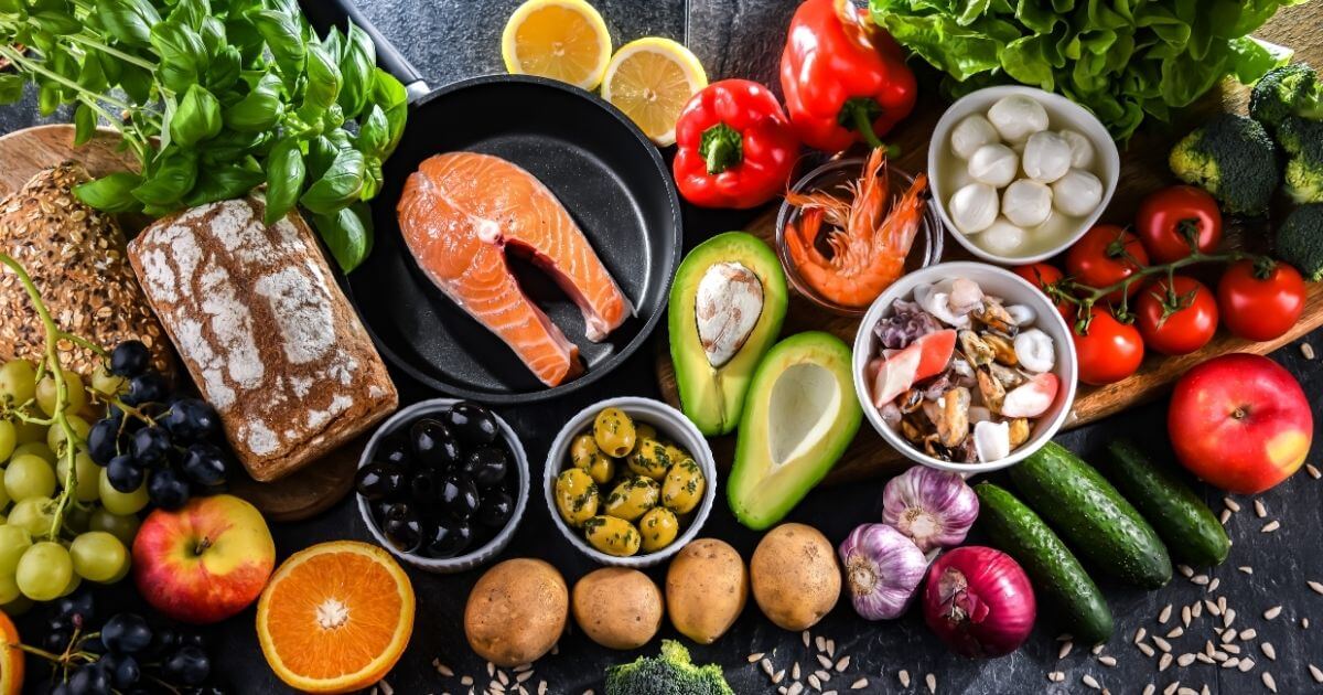 Whole, nutrient-dense foods including fish, vegetables, and healthy fats to support gut health